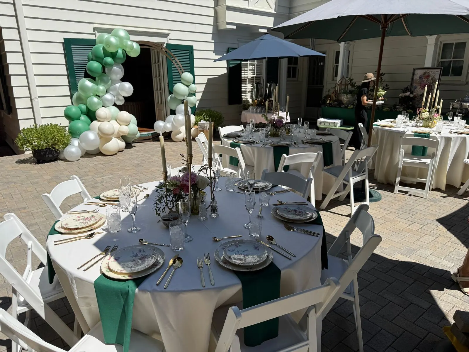 Courtyard tables set for an outdoor catered lunch near Union City