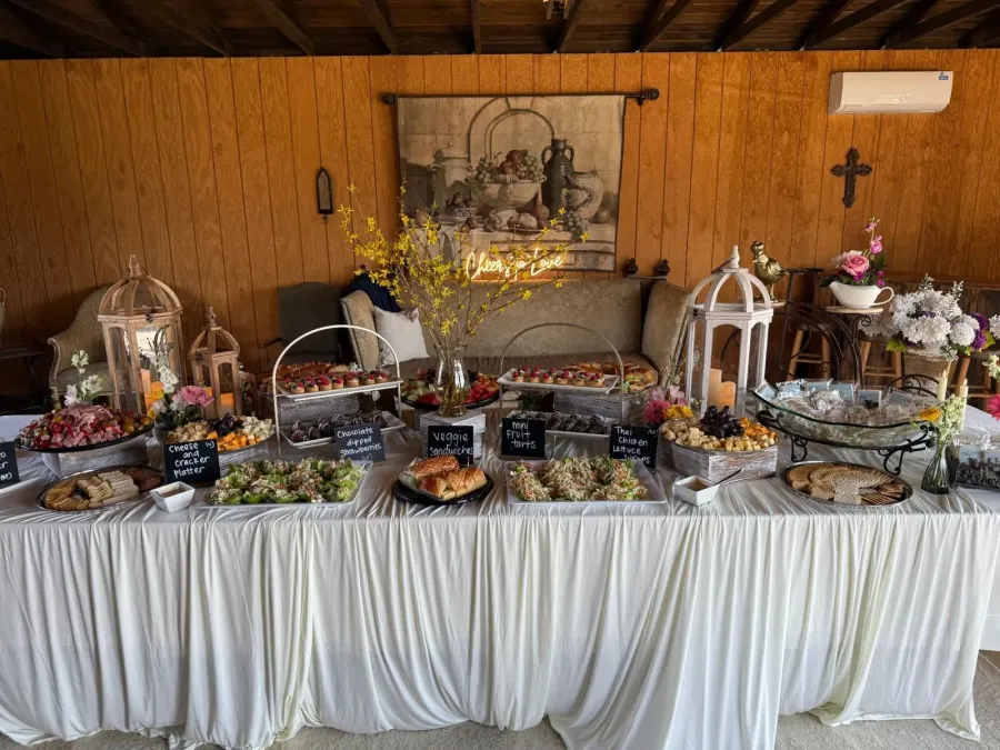 Grazing table of cheeses, fruit, and charcuterie built for a Fremont party