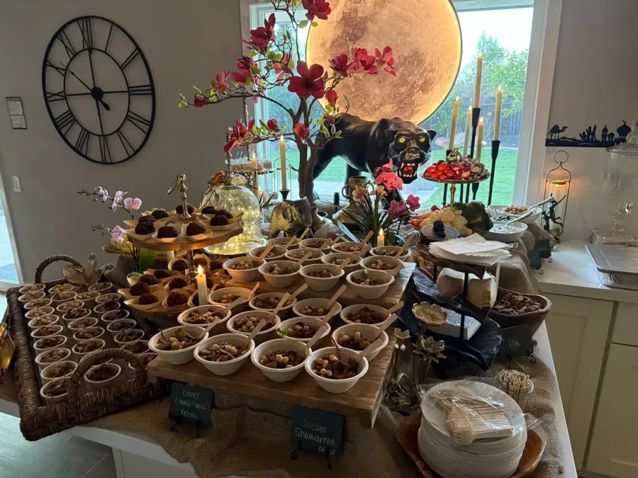 Mediterranean dinner buffet with chicken shawarma, döner kebob, salads, and sides catered for a Fremont event